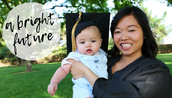 Photo of young woman wearing a graduation gown holding a baby wearing her graduation mortarboard cap with caption "a bright future"