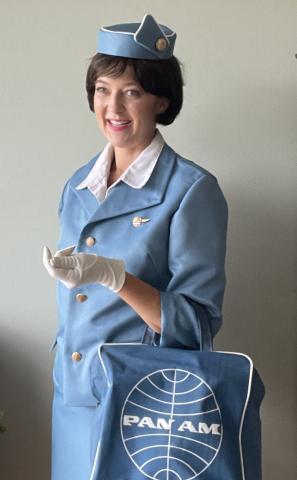 Leslie Goddard as Betty the Stewardess