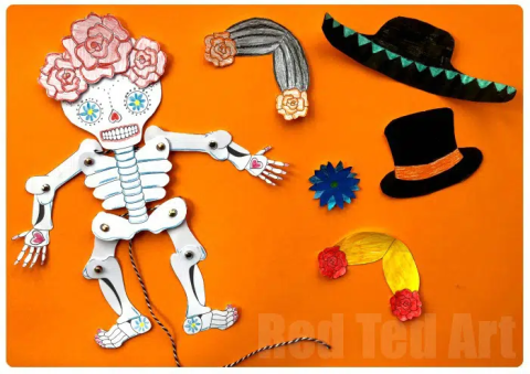 Skeleton paper puppet on left with additional accessories on the right