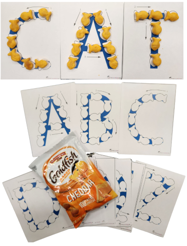 Alphabet flash cards and a package of Goldfish Crackers. The letters have goldfish outlines to fill with the Goldfish Crackers. Letters C-A-T spelled out cat, with the goldfish outlines filled in with crackers.