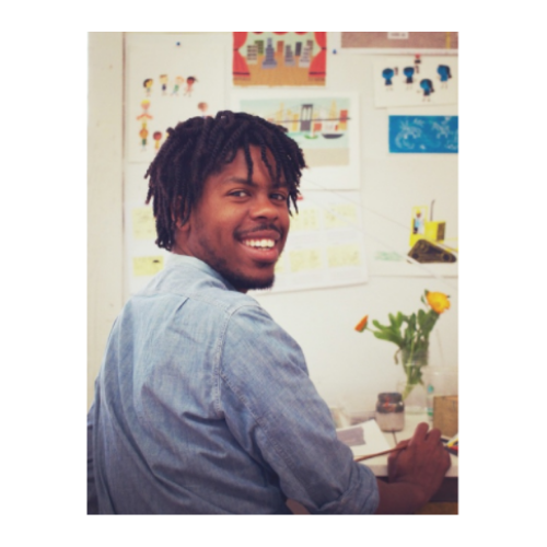 Image of artist Christian Robinson at his work table.